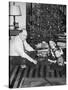 Father with Daughter and Son in Front of Christmas Tree, Ca. 1950-null-Stretched Canvas