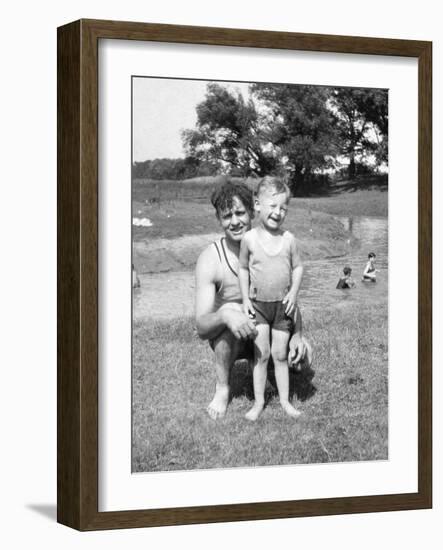 Father with Young Son at Water Hole, Ca. 1930-null-Framed Photographic Print