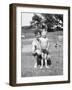 Father with Young Son at Water Hole, Ca. 1930-null-Framed Photographic Print