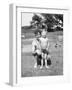 Father with Young Son at Water Hole, Ca. 1930-null-Framed Photographic Print