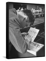 FBI Agent Examining Fingerprints-George Skadding-Framed Stretched Canvas