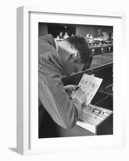 FBI Agent Examining Fingerprints-George Skadding-Framed Photographic Print