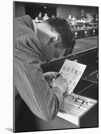 FBI Agent Examining Fingerprints-George Skadding-Mounted Photographic Print