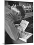 FBI Agent Examining Fingerprints-George Skadding-Mounted Photographic Print