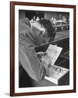 FBI Agent Examining Fingerprints-George Skadding-Framed Photographic Print