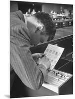 FBI Agent Examining Fingerprints-George Skadding-Mounted Photographic Print