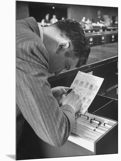 FBI Agent Examining Fingerprints-George Skadding-Mounted Photographic Print