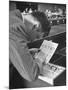FBI Agent Examining Fingerprints-George Skadding-Mounted Photographic Print