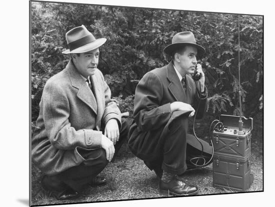 FBI Agent with an Huge Portable Phone During a Kidnapping Stakeout, Ca. 1940s-null-Mounted Photo