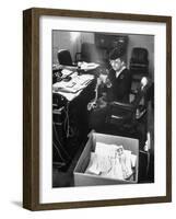 FDR's Secretary of Labor Frances Perkins, Packing Up Souvenirs Including Twine and Box of Letters-Cornell Capa-Framed Photographic Print