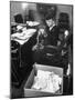 FDR's Secretary of Labor Frances Perkins, Packing Up Souvenirs Including Twine and Box of Letters-Cornell Capa-Mounted Photographic Print