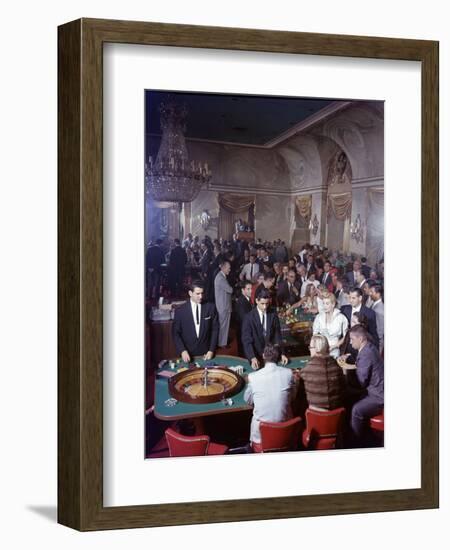 February 11, 1957: Tourists Gambling at the Nacional Hotel in Havana, Cuba-Ralph Morse-Framed Photographic Print