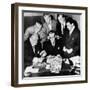 Federal and State Men Looking at Counterfeit Money Seized in Chicago, Feb, 2, 1952-null-Framed Photo