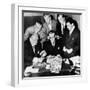 Federal and State Men Looking at Counterfeit Money Seized in Chicago, Feb, 2, 1952-null-Framed Photo