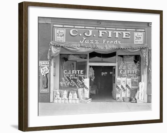 Feed store front, Alabama, 1936-Walker Evans-Framed Photographic Print