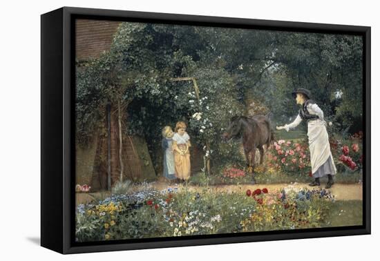 Feeding a Pony in a Surrey Garden-Edward Killingworth Johnson-Framed Stretched Canvas