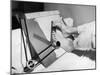 Feet of a Disabled Man Using a Drafting Board-null-Mounted Photo