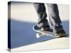 Feet on a Skateboard at the Edge of a Ramp-null-Stretched Canvas