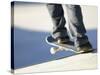 Feet on a Skateboard at the Edge of a Ramp-null-Stretched Canvas