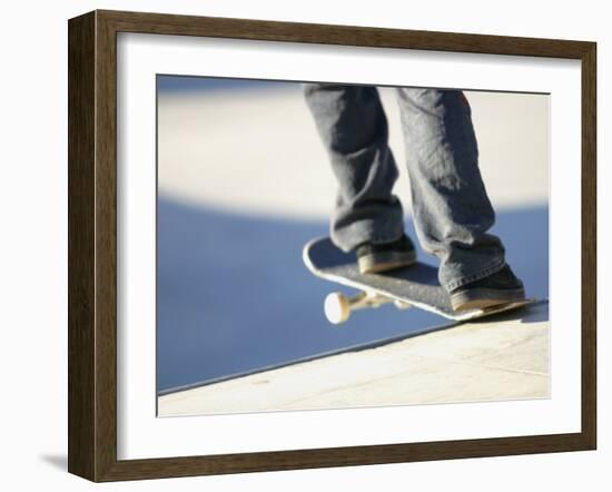 Feet on a Skateboard at the Edge of a Ramp-null-Framed Premium Photographic Print