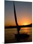 Felucca Silhouetted Against Setting Sun over the Nile at Luxor, Egypt-Cindy Miller Hopkins-Mounted Photographic Print