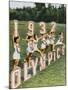 Female Athletes Perform a Routine to Publicise the 1932 Los Angeles Olympics-null-Mounted Photographic Print