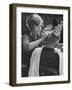 Female Barber Cutting a Customer's Hair in a Barber Shop-Ralph Crane-Framed Photographic Print