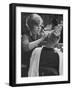 Female Barber Cutting a Customer's Hair in a Barber Shop-Ralph Crane-Framed Photographic Print