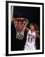 Female Basketball Player Dunking a Ball Through the Hoop-null-Framed Premium Photographic Print