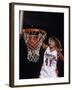 Female Basketball Player Dunking a Ball Through the Hoop-null-Framed Photographic Print