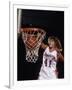 Female Basketball Player Dunking a Ball Through the Hoop-null-Framed Photographic Print