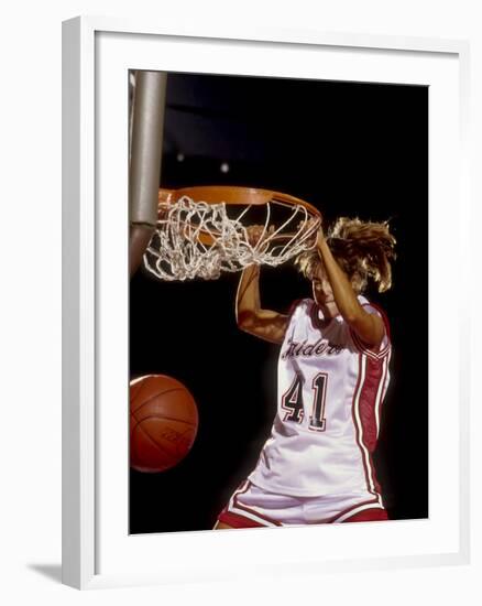 Female Basketball Player Slam Dunking-null-Framed Photographic Print