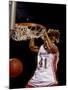 Female Basketball Player Slam Dunking-null-Mounted Photographic Print