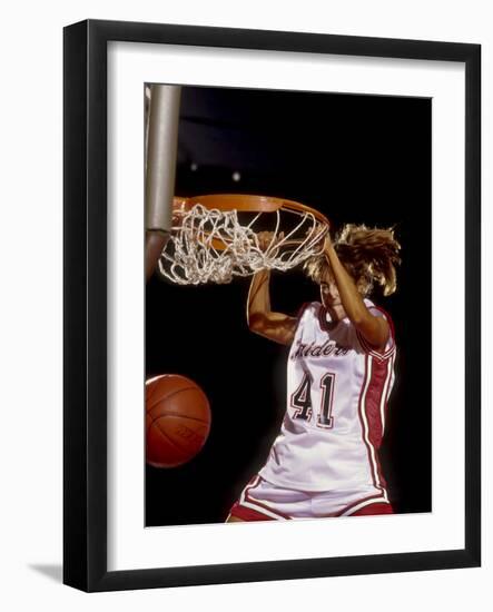 Female Basketball Player Slam Dunking-null-Framed Photographic Print