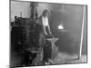 Female Blacksmith-null-Mounted Photographic Print