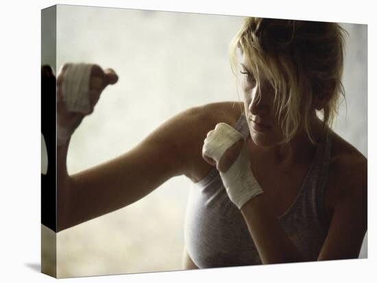 Female Boxer Practicing-null-Stretched Canvas