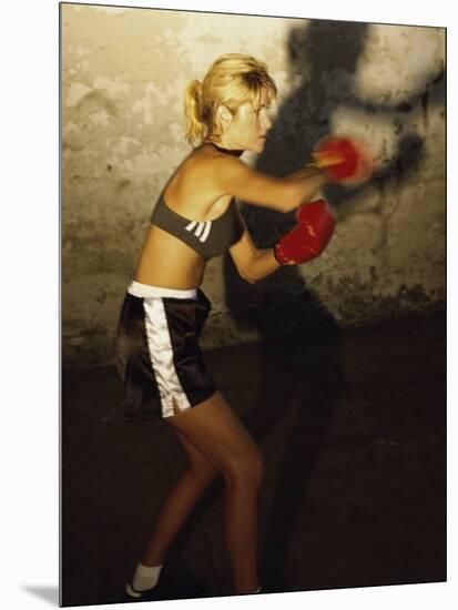 Female Boxer Practicing-null-Mounted Photographic Print