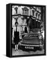 Female Chauffeur Standing by a 1964 Morris Oxford, 1964-null-Framed Stretched Canvas