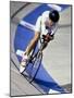 Female Cyclist Racing on the Velodrome Track-null-Mounted Photographic Print