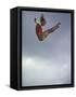 Female Diver Flying Through the Air, California, USA-Paul Sutton-Framed Stretched Canvas