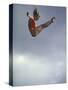 Female Diver Flying Through the Air, California, USA-Paul Sutton-Stretched Canvas