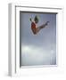 Female Diver Flying Through the Air, California, USA-Paul Sutton-Framed Photographic Print