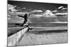 Female Figure Jumping on a Beach-Rory Garforth-Mounted Photographic Print