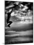 Female Figure Jumping on a Beach-Rory Garforth-Mounted Photographic Print