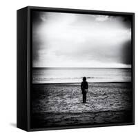 Female Figure Standing Alone on Beach-Rory Garforth-Framed Stretched Canvas