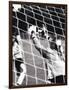 Female Goalie Attempting to Stop a Soccer Ball-null-Framed Photographic Print