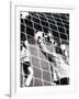 Female Goalie Attempting to Stop a Soccer Ball-null-Framed Photographic Print