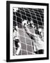 Female Goalie Attempting to Stop a Soccer Ball-null-Framed Photographic Print