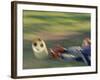 Female Goalie Attempting to Stop a Soccer Ball-null-Framed Photographic Print