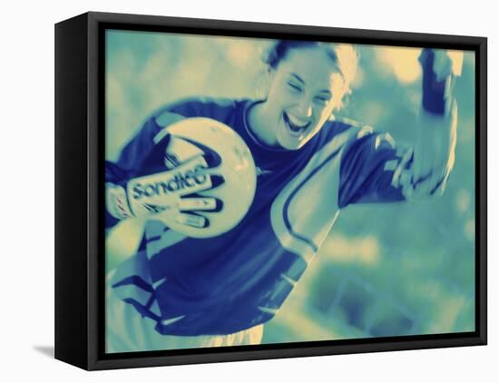 Female Goalie Holding a Soccer Ball-null-Framed Stretched Canvas